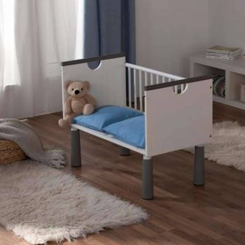 Особенности детской приставной кроватки для новорожденных